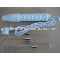 hand holding high frequency beauty equipment